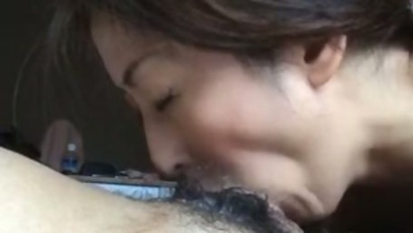 Hot and mature Japanese wifey eats small hairy dick for cum