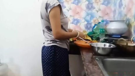 Wife In A Red Saree In The Kitchen