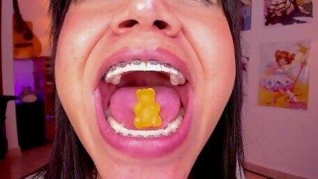 Lila Jordan swallows a yellow gummy bear, Giantess Vore fetish